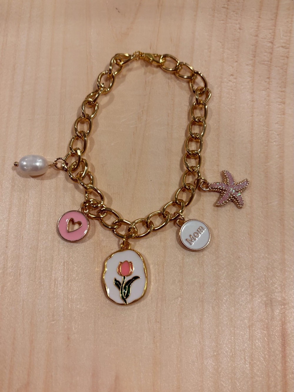 Gold Charm Bracelet with Pink Accents and Pearl Charm